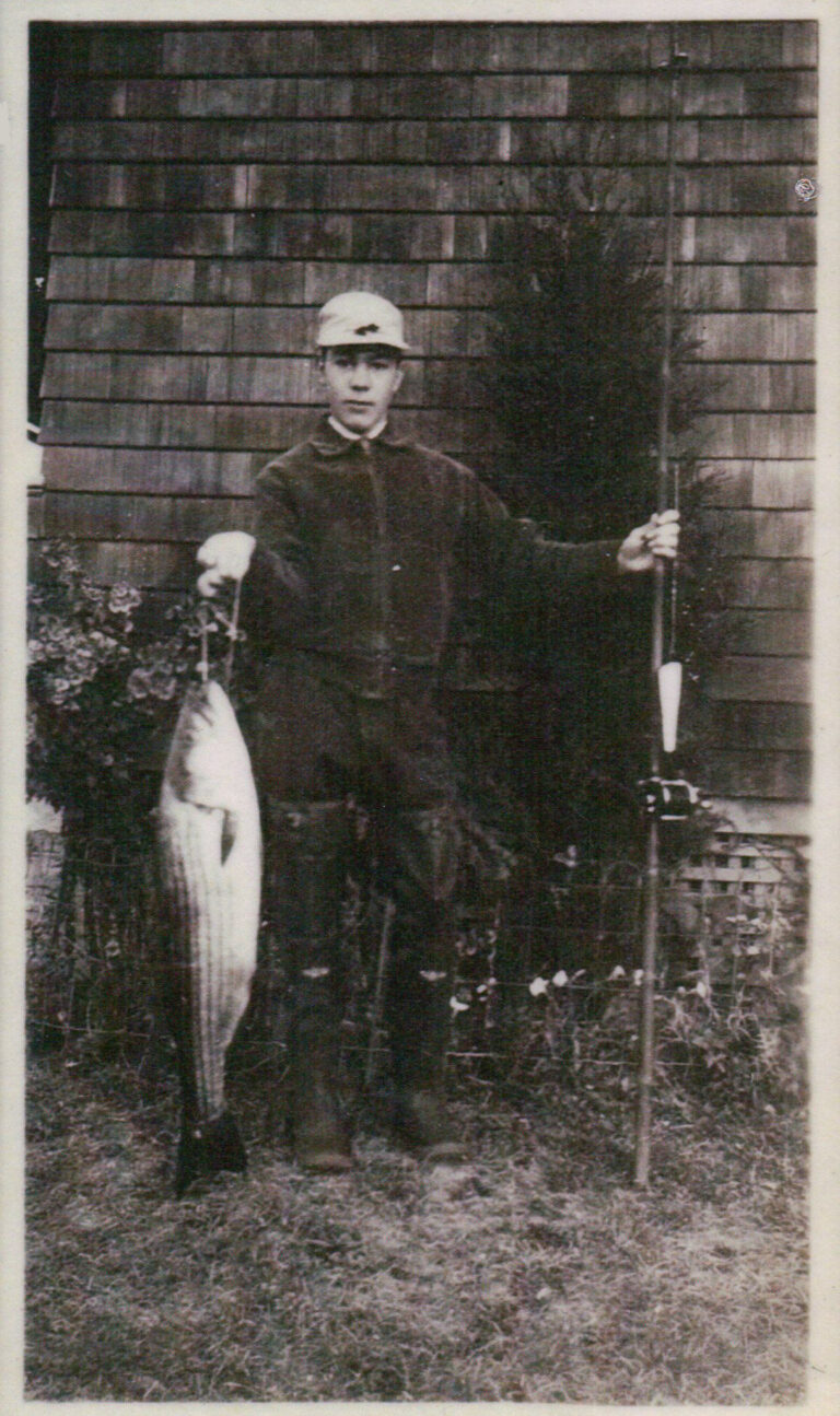 Nelson H White with striped bass